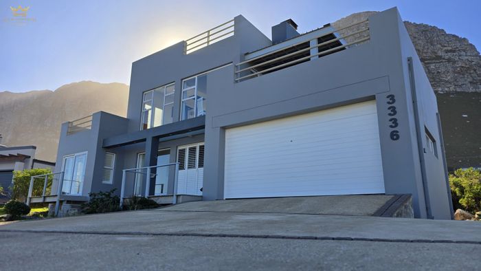 House For Sale at Sunny Seas Estate: Ocean views, spacious garden, and outdoor living.