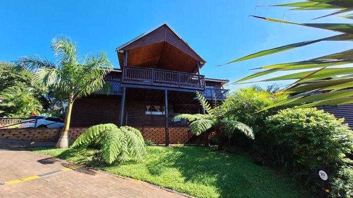 For Sale: Southport Townhouse with sea views, flat, pool, and clubhouse amenities.
