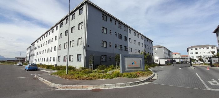 2-Bedroom Apartment For Sale in Belhar with Security, Parking, and Fitted Kitchen.