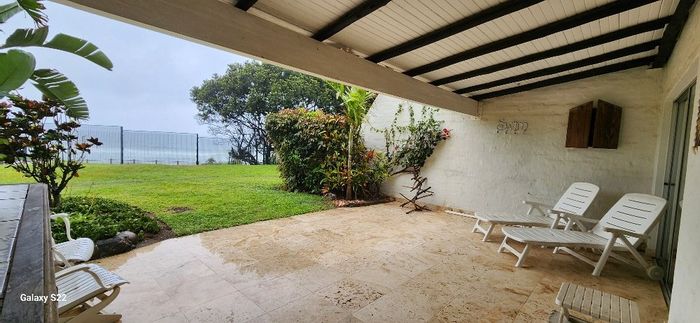 For Sale: Apartment in Umhlanga Central with pools, tennis courts, and beach access.