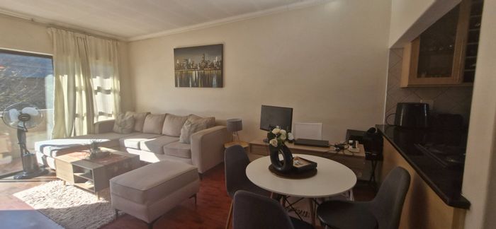 For Sale: Buccleuch Townhouse with 2 beds, garage, pool, and 24-hour security.