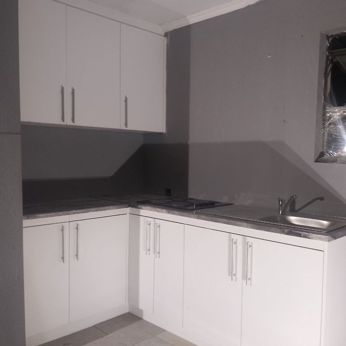 1 Bedroom Apartment To Rent in Centurion Central with parking, water, and WiFi included.