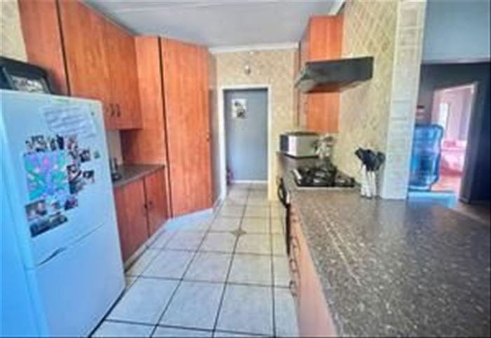 For Sale: Spacious 3-Bedroom House in Sunward Park with Pool and Study.