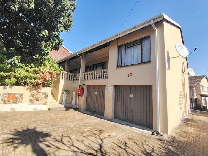 For Sale: House in Margate Beach with multiple units, sea views, and garages.