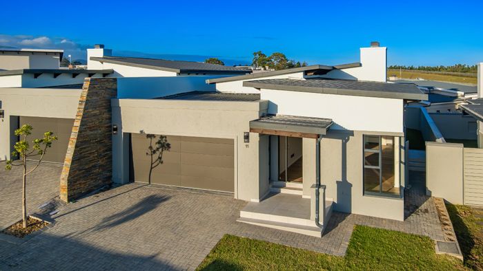 For Sale: House in Eden Residential Estate with 3 beds, double garage, and built-in braai.