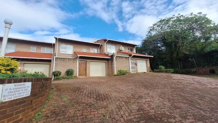 For Sale: Southport Townhouse with pool, security, inverter, and beach proximity.