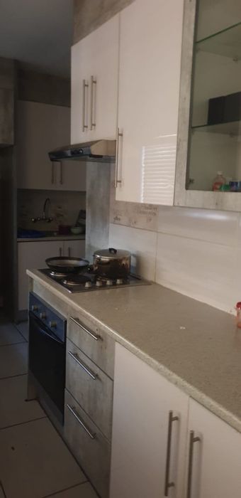For Sale: House in Doornpoort with 4 bedrooms, double carport, and large yard.