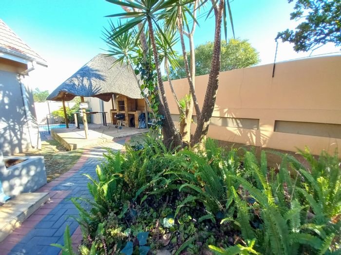 For Sale: Spacious 4-bedroom house in Sunnyridge with solar pool and secure outdoor spaces.
