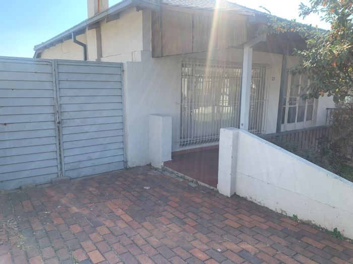 3-Bedroom House For Sale in Rosettenville: Spacious yard, bachelor cottage, ample parking.