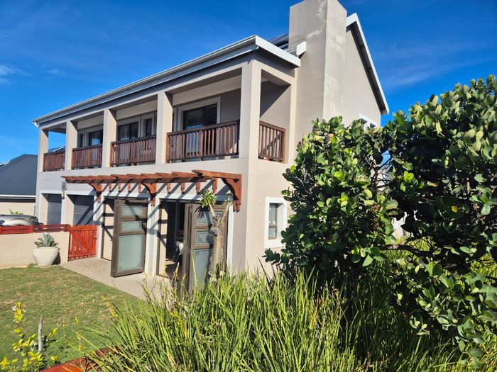 Kraaibosch House For Sale: Secure estate living, braai room, solar panels, family-friendly.