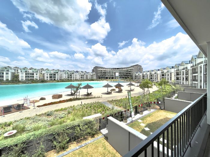 Waterfall Apartment To Rent: 3-bed, lagoon views, gym, pool, and concierge services.