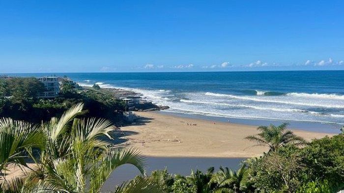 For Sale: Uvongo Apartment with ocean views, pools, tennis court, and beach access.