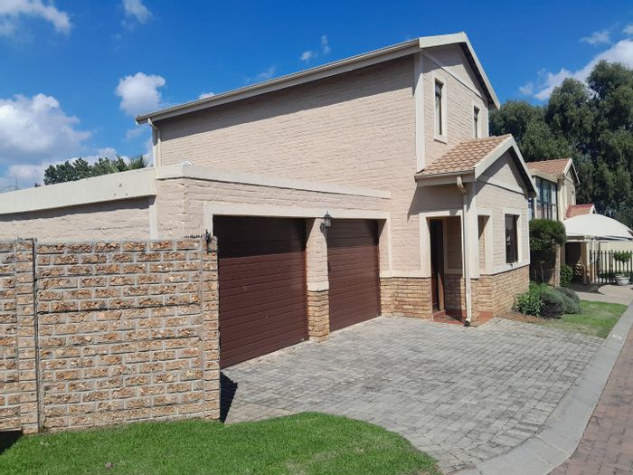 For Sale: 4-Bedroom House in Halfway Gardens with garden, patio, and security access.