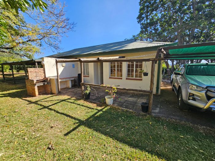For Sale: Townhouse in White River Ext 16 with pool, patio, and carport.