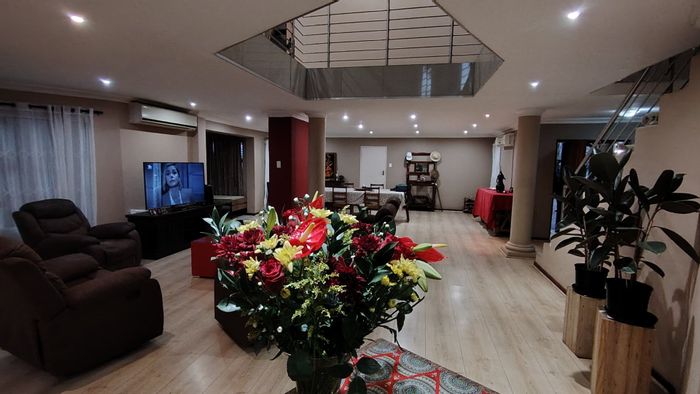 For Sale: Spacious Rooihuiskraal North house with pool, gym, and triple garage.