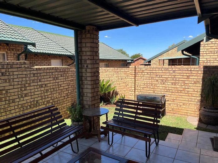 Highveld Townhouse For Sale: 2 beds, pet-friendly garden, secure parking, close to amenities.