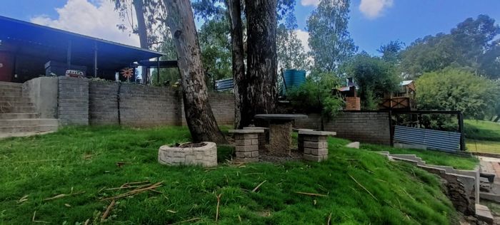 Charming Boschdraai house for sale: river access, patio, solar panels, and more.