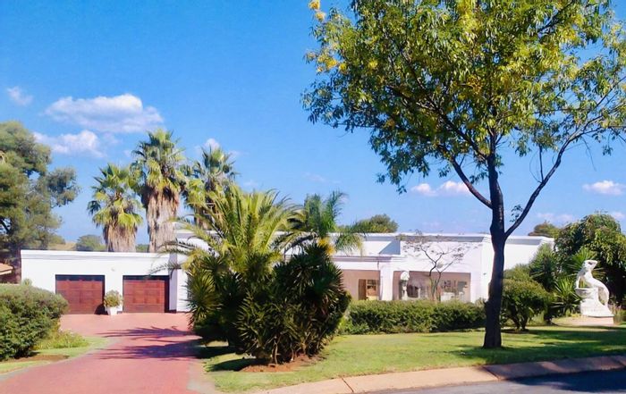 Erasmia House For Sale: 4 bedrooms, pool, braai area, spacious living spaces.