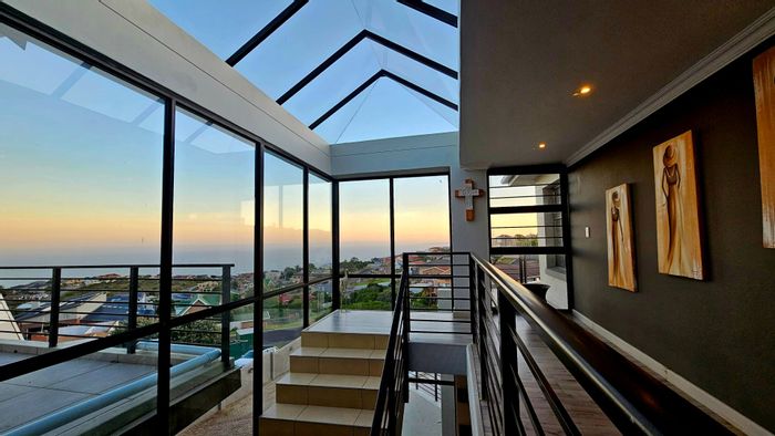 For Sale: House in Dana Bay with sea views, 5 en-suite bedrooms, and 4 garages.