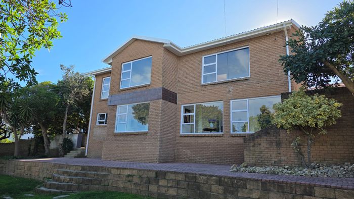 For Sale: Spacious 5-bedroom house in Dana Bay with sea views and garden.