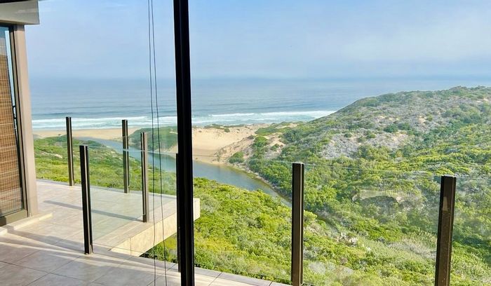 House for Sale in Moquini Coastal Estate: 6 bedrooms, lagoon views, indoor pool.