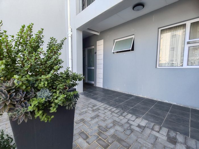 For Sale: 2-Bedroom Apartment in Fairview with private yard and 24-hour security.