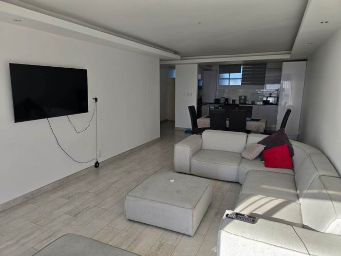 2-Bed Apartment To Rent in Summerstrand with ocean views and secure parking.