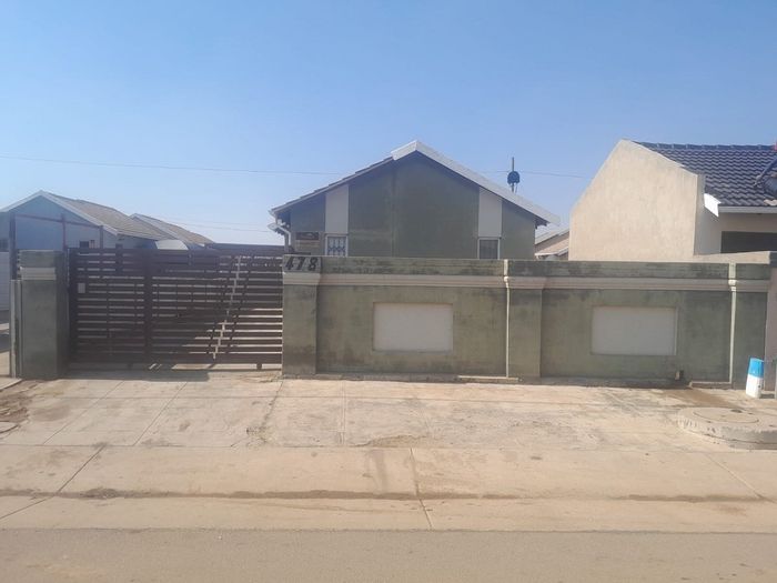 For Sale: 2-bedroom house in Savanna City with solar panels and paved yard.