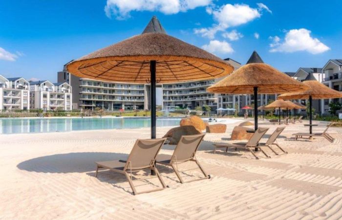 Waterfall Apartment To Rent: Lagoon views, gym, spa, and fiber-ready amenities.