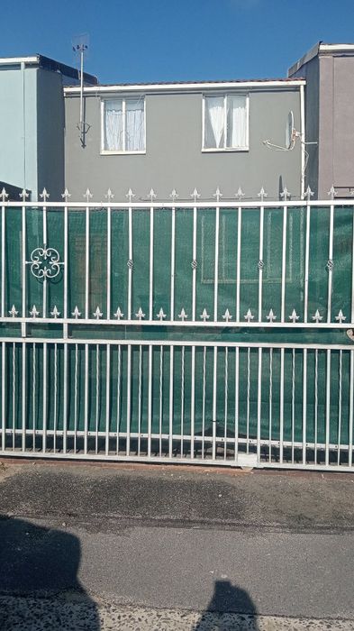 For Sale: 3-Bedroom House in Westridge with secure parking and enclosed yard.
