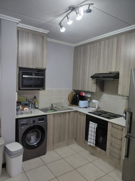 Lonehill Apartment For Sale: Private garden, clubhouse, laundry, and kiddies' play area.