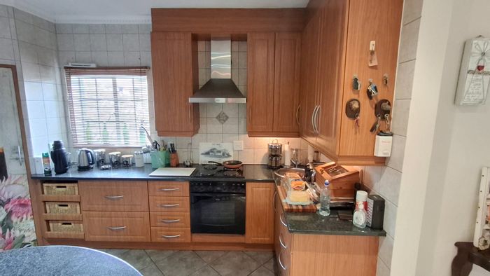 For Sale: 3-Bedroom Townhouse in Montana Park with patio, double garage, and security.