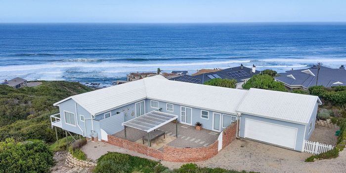 House for Sale in Dana Bay: Ocean views, spacious living, double garage, private location.