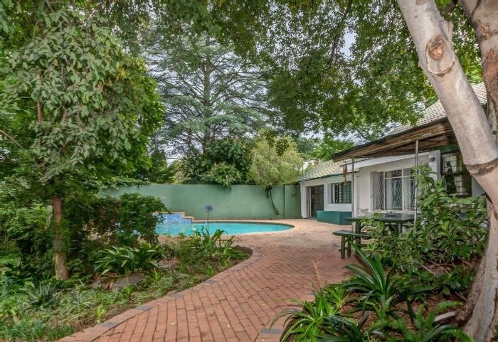 Bryanston House For Sale: Family home with cottages, pool, and ample parking.