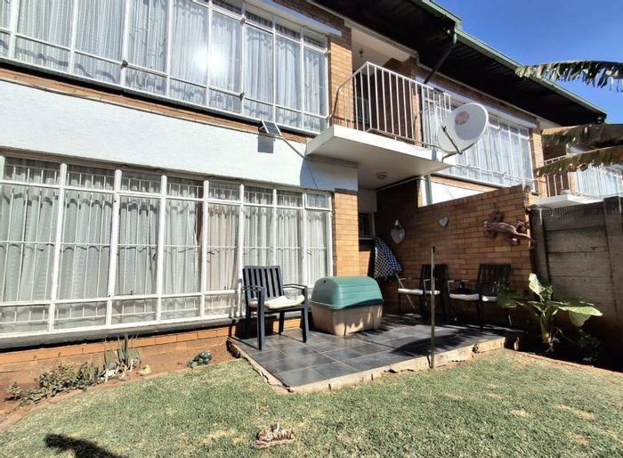 For Sale: Townhouse in Marlands with secure parking, pet-friendly complex, and private entrance.
