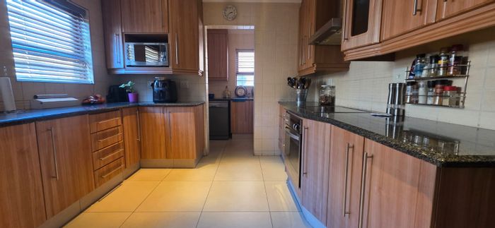 For Sale: Bartlett House with 4 bedrooms, pool, and secure estate living.