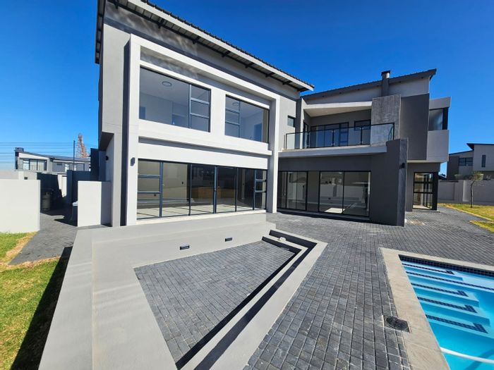 For Sale: House in Midstream Estate with pool, braai area, and spacious garden.