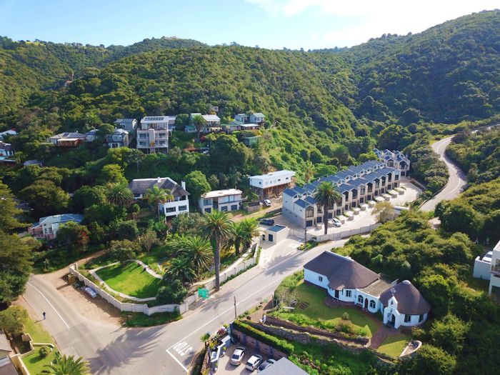 For Sale: 3-bed, 4-bath townhouse in Wilderness Central with secure parking.