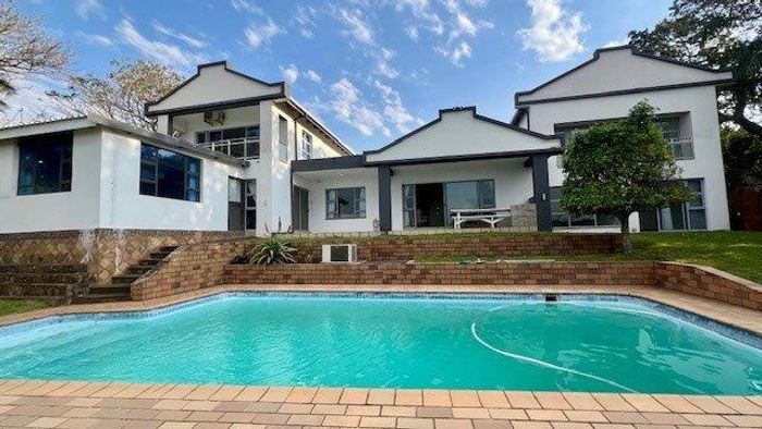 House for Sale in Uvongo: 7 bedrooms, pool, wellness retreat potential, sea views.