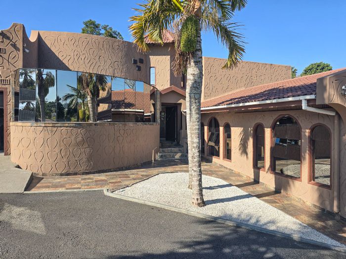 For Sale: Grosvenor House with jacuzzi, garage for 3, energy-efficient features.
