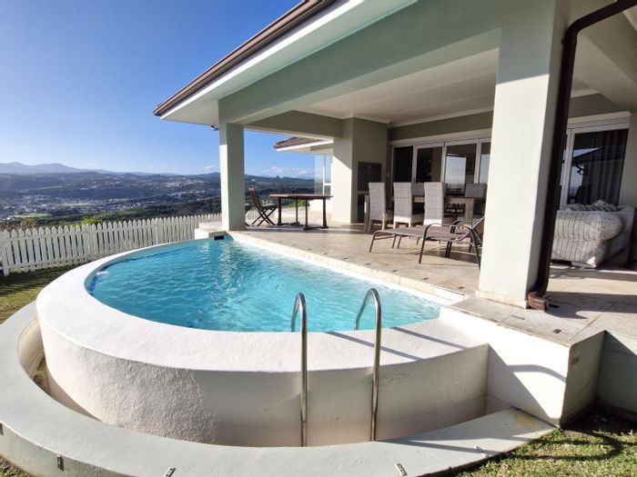 For Sale: House in Pezula Golf Estate, 4 beds, golf course access, serene lifestyle.