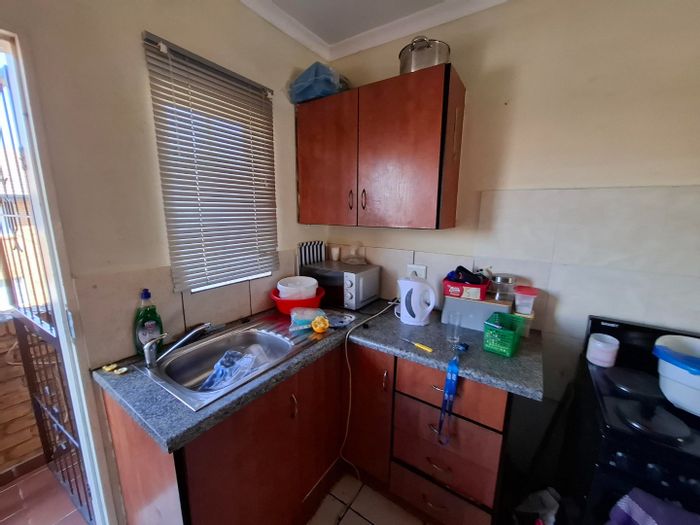 For Sale: Bachelor Apartment in Lotus Gardens, Tenant in Place, Prepaid Utilities.