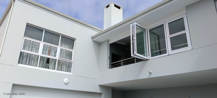 Ocean views, open-plan living, braai room, double garage in Island View house for sale.