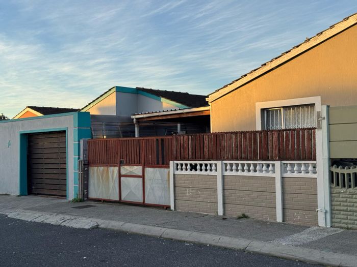 2-Bedroom House For Sale in Portlands with off-street parking and spacious backyard.