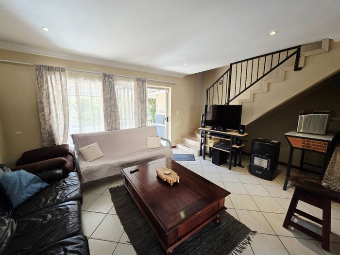 La Montagne Townhouse For Sale: 3 bedrooms, pet-friendly garden, secure complex amenities.