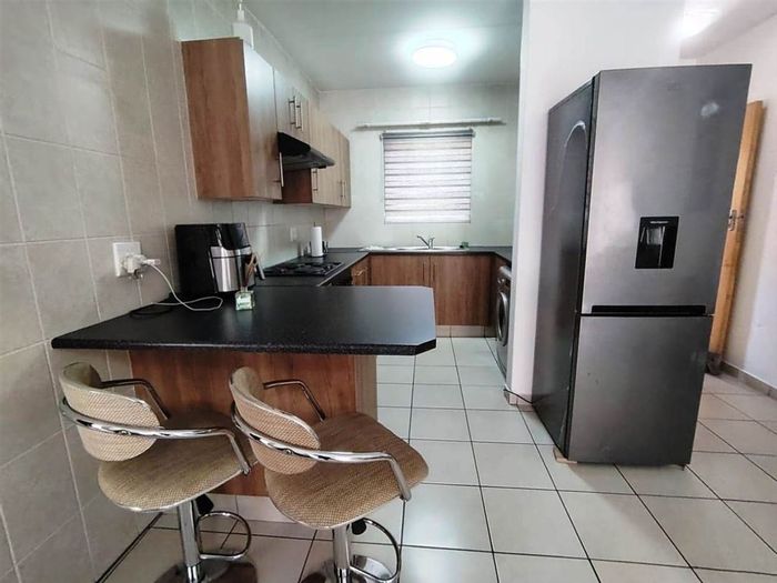 Cason Apartment For Sale: 2 bedrooms, carport, low-maintenance living, ample storage.
