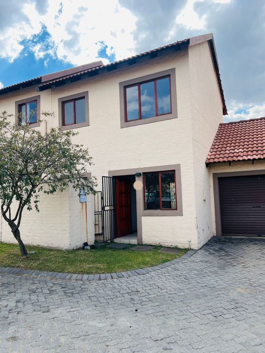 For Sale: House in Carlswald with 2 bedrooms, garage, and private garden.