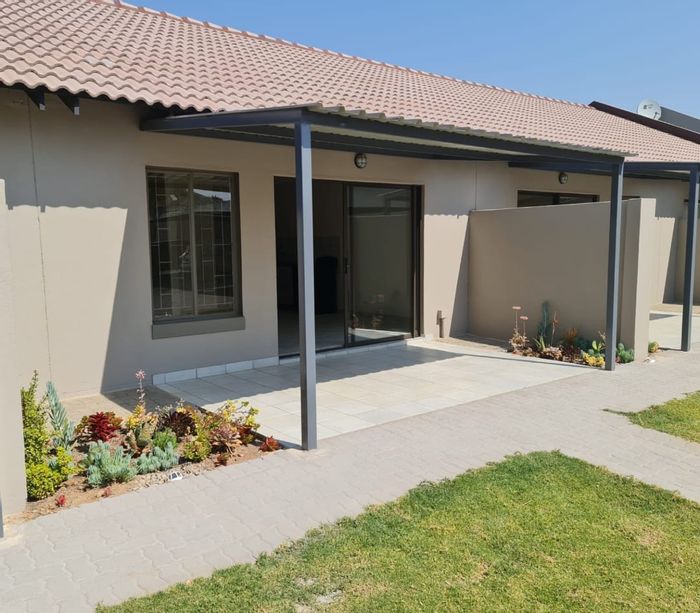 2-Bedroom Townhouse To Rent in Heatherdale AH with private garden and security access.