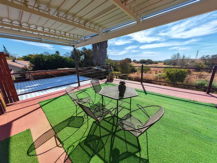 For Sale: Dan Pienaar House with guest suites, solar power, and ample parking.
