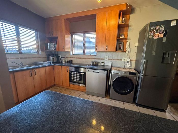 Sonneveld House For Sale: 3 Bedrooms, 2 Bathrooms, Garage, and Carport.